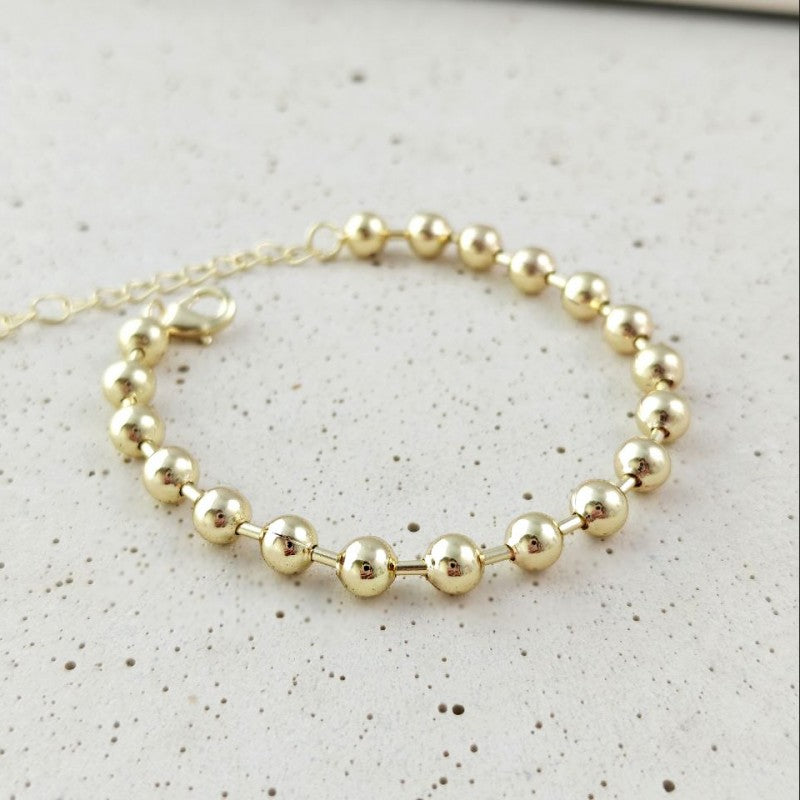 Bransoletka na rękę stal chirurgiczna pozłacana 14k złotem, kuleczki 6mm BST1762