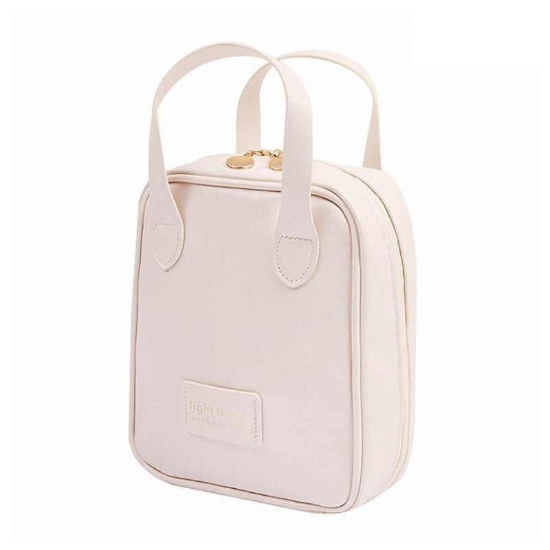 Kosmetyczka organizer na kosmetyki z rączką 17x7x19cm kremowa KS128B